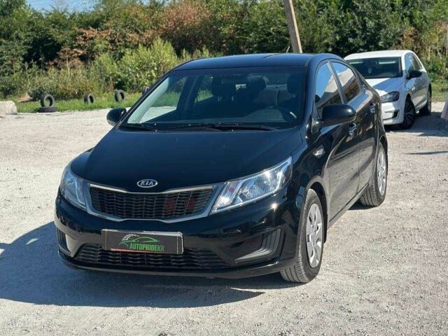 Чорний Кіа Ріо, об'ємом двигуна 1.4 л та пробігом 53 тис. км за 8933 $, фото 4 на Automoto.ua