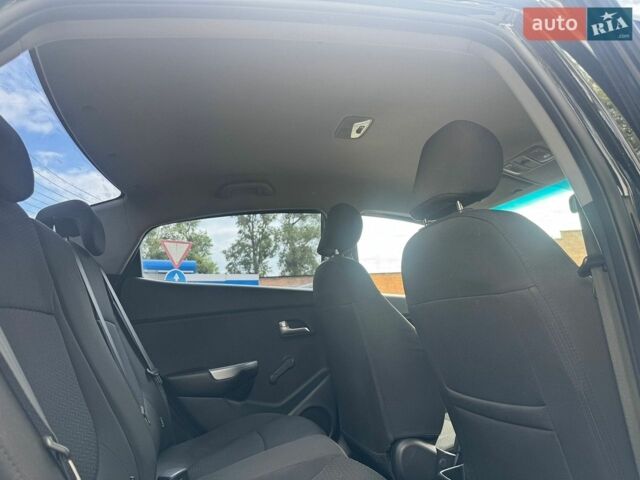 Черный Киа Рио, объемом двигателя 1.4 л и пробегом 155 тыс. км за 7500 $, фото 25 на Automoto.ua