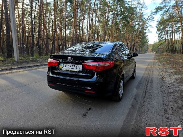 Черный Киа Рио, объемом двигателя 1.6 л и пробегом 103 тыс. км за 6800 $, фото 5 на Automoto.ua
