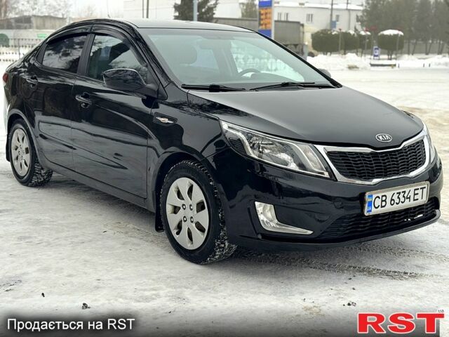 Черный Киа Рио, объемом двигателя 1.4 л и пробегом 155 тыс. км за 7500 $, фото 1 на Automoto.ua