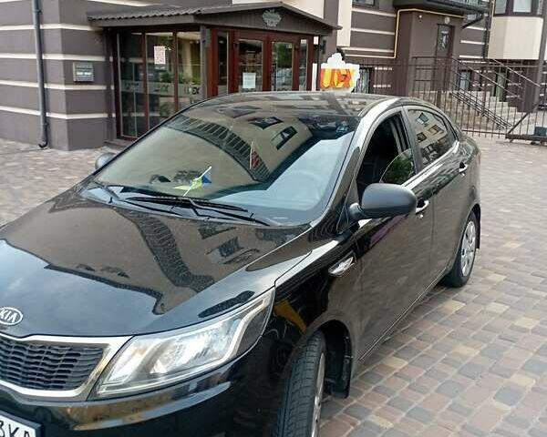 Чорний Кіа Ріо, об'ємом двигуна 1.4 л та пробігом 162 тис. км за 7500 $, фото 8 на Automoto.ua