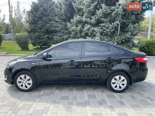 Черный Киа Рио, объемом двигателя 1.6 л и пробегом 127 тыс. км за 8300 $, фото 4 на Automoto.ua