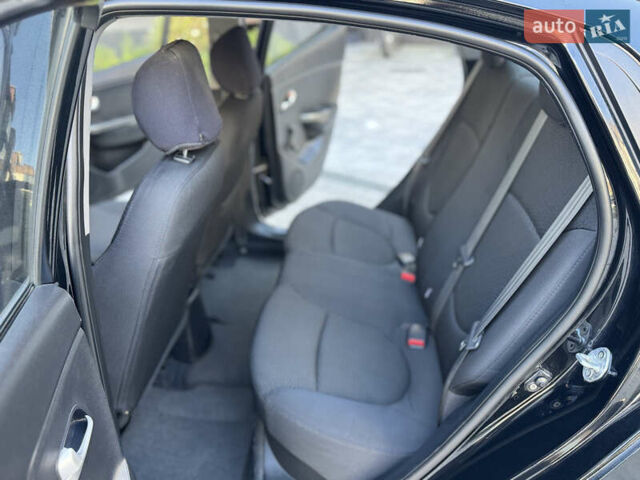 Чорний Кіа Ріо, об'ємом двигуна 1.4 л та пробігом 199 тис. км за 5950 $, фото 11 на Automoto.ua