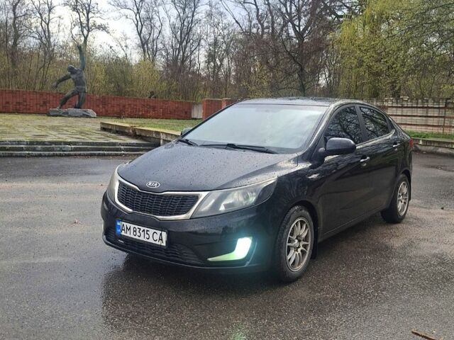 Черный Киа Рио, объемом двигателя 1.4 л и пробегом 197 тыс. км за 7000 $, фото 1 на Automoto.ua