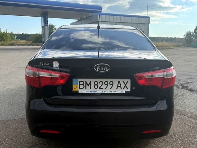 Чорний Кіа Ріо, об'ємом двигуна 1.4 л та пробігом 74 тис. км за 9100 $, фото 1 на Automoto.ua