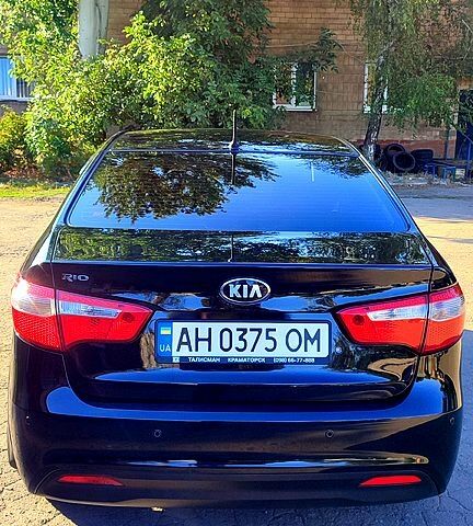 Черный Киа Рио, объемом двигателя 1.4 л и пробегом 120 тыс. км за 7700 $, фото 3 на Automoto.ua