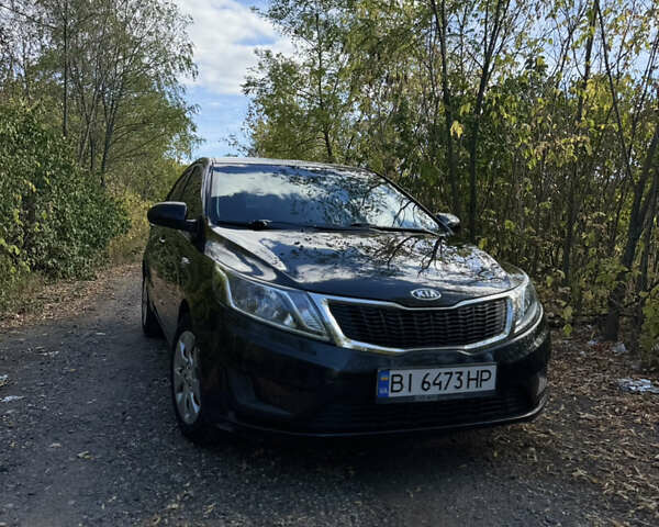 Черный Киа Рио, объемом двигателя 1.4 л и пробегом 173 тыс. км за 7300 $, фото 11 на Automoto.ua