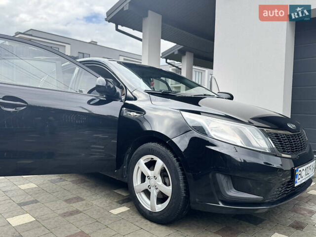 Чорний Кіа Ріо, об'ємом двигуна 1.4 л та пробігом 199 тис. км за 5999 $, фото 31 на Automoto.ua
