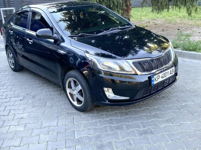Черный Киа Рио, объемом двигателя 1.6 л и пробегом 330 тыс. км за 6300 $, фото 2 на Automoto.ua