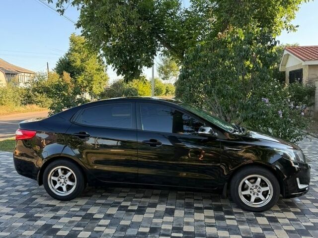 Чорний Кіа Ріо, об'ємом двигуна 1.59 л та пробігом 104 тис. км за 8900 $, фото 2 на Automoto.ua
