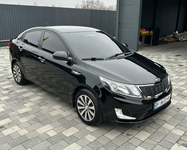 Черный Киа Рио, объемом двигателя 1.4 л и пробегом 111 тыс. км за 7500 $, фото 6 на Automoto.ua