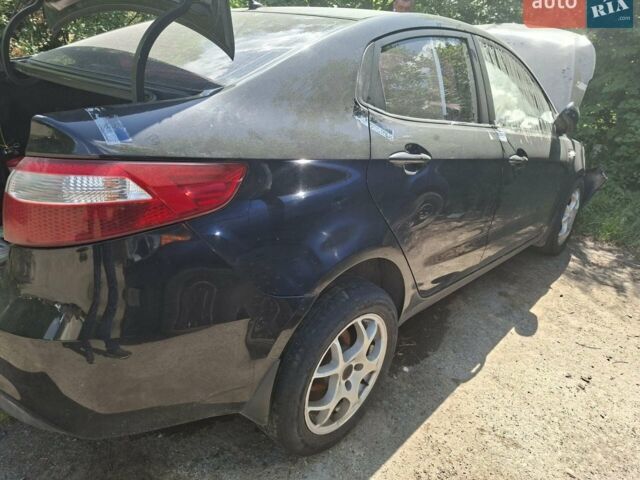 Черный Киа Рио, объемом двигателя 1.4 л и пробегом 255 тыс. км за 2200 $, фото 2 на Automoto.ua