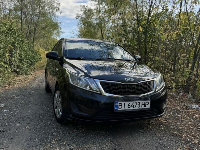 Чорний Кіа Ріо, об'ємом двигуна 1.4 л та пробігом 173 тис. км за 7300 $, фото 4 на Automoto.ua