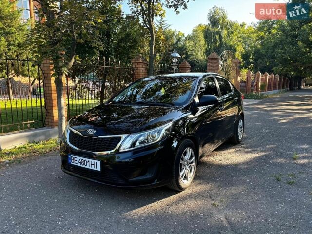 Чорний Кіа Ріо, об'ємом двигуна 1.4 л та пробігом 165 тис. км за 7900 $, фото 4 на Automoto.ua