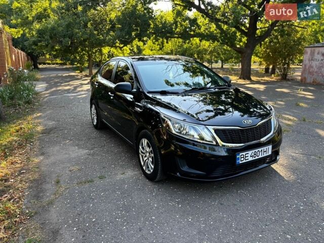 Чорний Кіа Ріо, об'ємом двигуна 1.4 л та пробігом 165 тис. км за 7900 $, фото 5 на Automoto.ua
