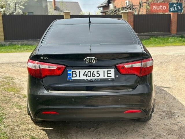 Черный Киа Рио, объемом двигателя 1.4 л и пробегом 108 тыс. км за 7950 $, фото 4 на Automoto.ua