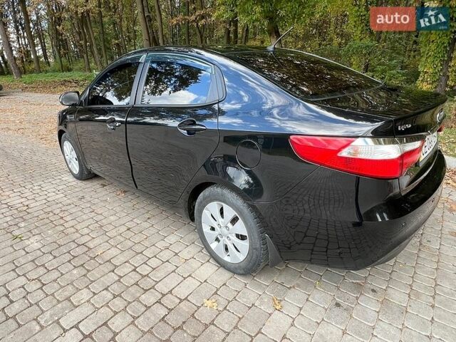 Черный Киа Рио, объемом двигателя 1.59 л и пробегом 160 тыс. км за 8200 $, фото 2 на Automoto.ua