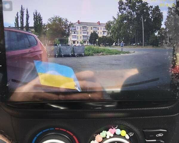 Чорний Кіа Ріо, об'ємом двигуна 1.4 л та пробігом 123 тис. км за 7600 $, фото 9 на Automoto.ua