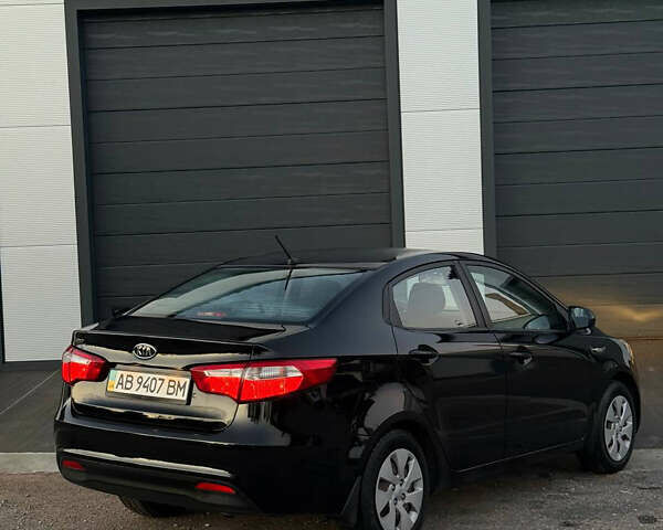 Чорний Кіа Ріо, об'ємом двигуна 1.4 л та пробігом 136 тис. км за 6900 $, фото 5 на Automoto.ua