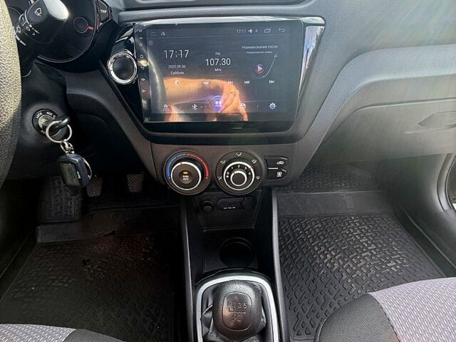 Чорний Кіа Ріо, об'ємом двигуна 1.4 л та пробігом 74 тис. км за 9100 $, фото 6 на Automoto.ua