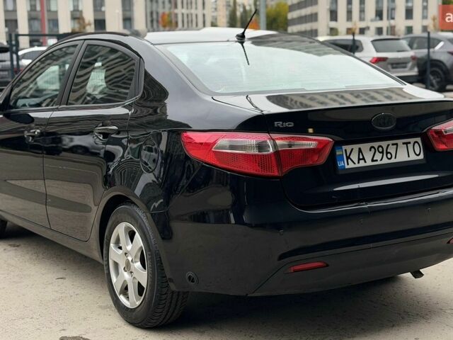 Чорний Кіа Ріо, об'ємом двигуна 1.4 л та пробігом 202 тис. км за 6900 $, фото 2 на Automoto.ua