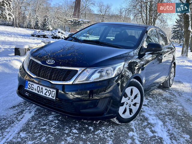Чорний Кіа Ріо, об'ємом двигуна 1.4 л та пробігом 245 тис. км за 7600 $, фото 9 на Automoto.ua