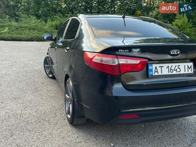 Чорний Кіа Ріо, об'ємом двигуна 1.4 л та пробігом 95 тис. км за 7300 $, фото 8 на Automoto.ua