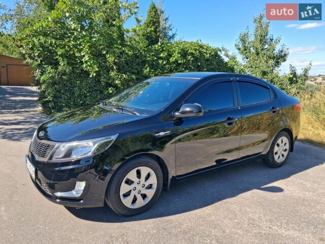 Чорний Кіа Ріо, об'ємом двигуна 1.59 л та пробігом 191 тис. км за 9300 $, фото 2 на Automoto.ua