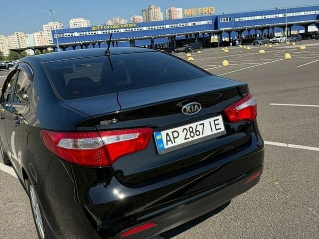 Чорний Кіа Ріо, об'ємом двигуна 1.59 л та пробігом 230 тис. км за 7000 $, фото 2 на Automoto.ua
