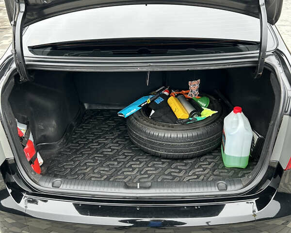 Черный Киа Рио, объемом двигателя 1.4 л и пробегом 111 тыс. км за 7500 $, фото 14 на Automoto.ua