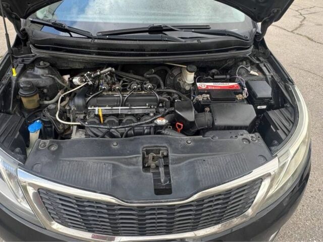 Чорний Кіа Ріо, об'ємом двигуна 1.6 л та пробігом 273 тис. км за 6200 $, фото 7 на Automoto.ua