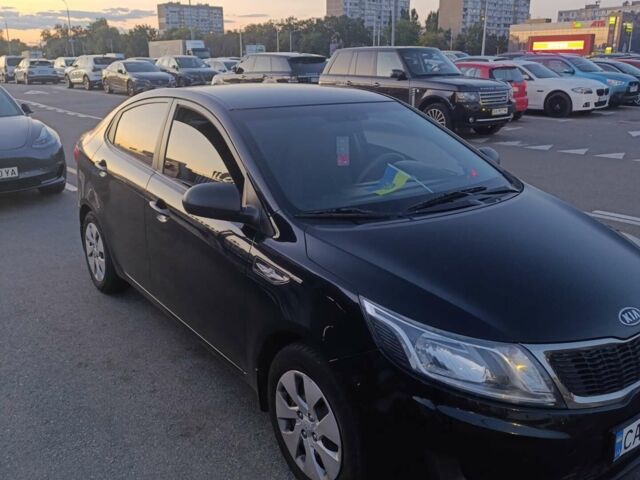 Чорний Кіа Ріо, об'ємом двигуна 1.4 л та пробігом 162 тис. км за 7500 $, фото 7 на Automoto.ua