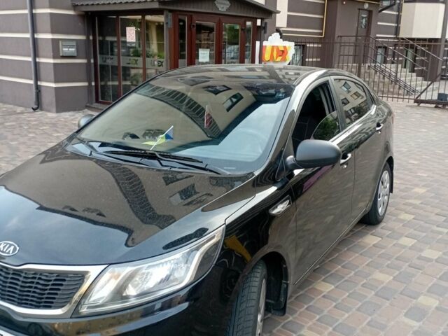 Чорний Кіа Ріо, об'ємом двигуна 1.4 л та пробігом 162 тис. км за 7500 $, фото 8 на Automoto.ua