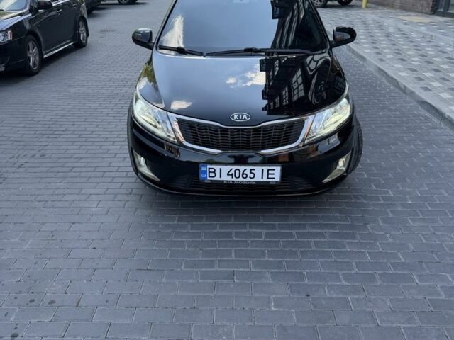 Чорний Кіа Ріо, об'ємом двигуна 1.4 л та пробігом 103 тис. км за 7999 $, фото 1 на Automoto.ua