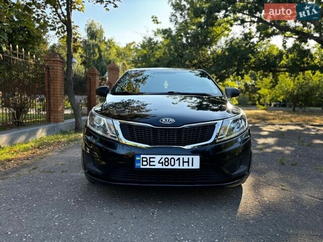 Чорний Кіа Ріо, об'ємом двигуна 1.4 л та пробігом 165 тис. км за 7900 $, фото 3 на Automoto.ua