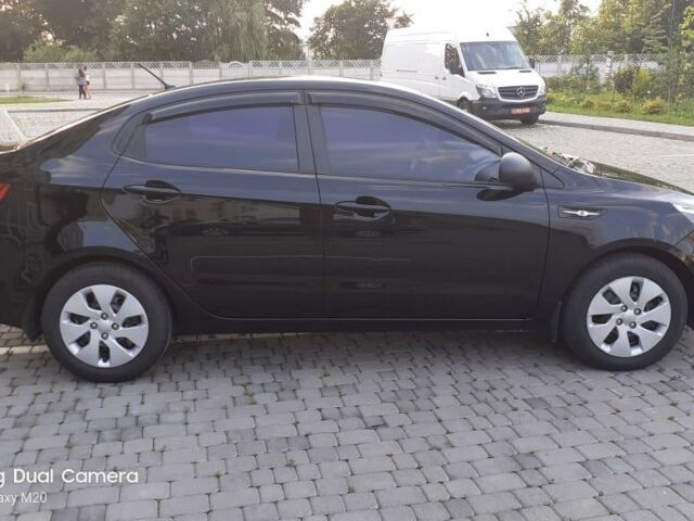 Чорний Кіа Ріо, об'ємом двигуна 1.4 л та пробігом 80 тис. км за 8700 $, фото 2 на Automoto.ua