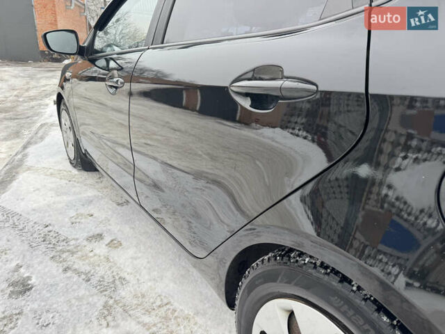 Черный Киа Рио, объемом двигателя 1.4 л и пробегом 155 тыс. км за 7500 $, фото 15 на Automoto.ua