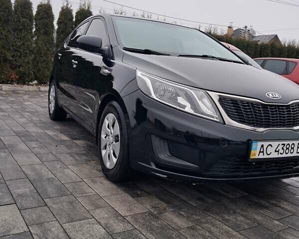 Черный Киа Рио, объемом двигателя 1.4 л и пробегом 244 тыс. км за 6900 $, фото 1 на Automoto.ua