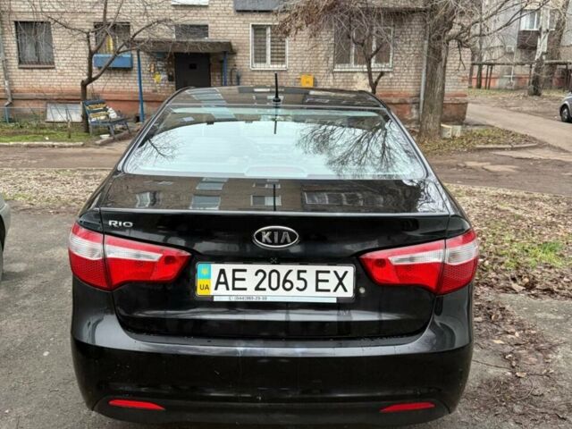 Чорний Кіа Ріо, об'ємом двигуна 1.4 л та пробігом 154 тис. км за 7500 $, фото 2 на Automoto.ua