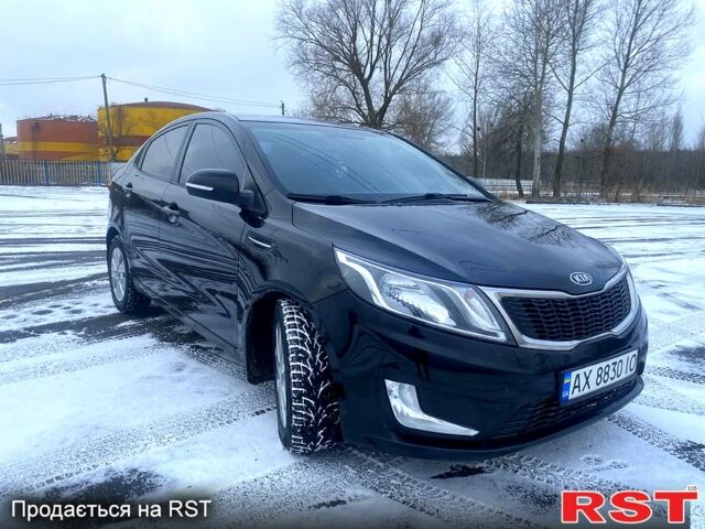 Черный Киа Рио, объемом двигателя 1.6 л и пробегом 25000 тыс. км за 6900 $, фото 2 на Automoto.ua