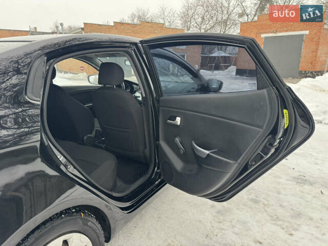 Черный Киа Рио, объемом двигателя 1.4 л и пробегом 155 тыс. км за 7500 $, фото 28 на Automoto.ua