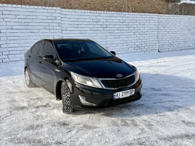 Чорний Кіа Ріо, об'ємом двигуна 1.6 л та пробігом 270 тис. км за 6499 $, фото 2 на Automoto.ua