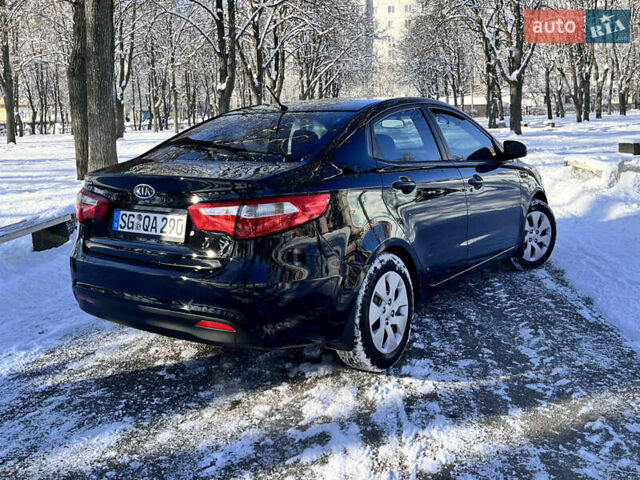Чорний Кіа Ріо, об'ємом двигуна 1.4 л та пробігом 245 тис. км за 7600 $, фото 15 на Automoto.ua
