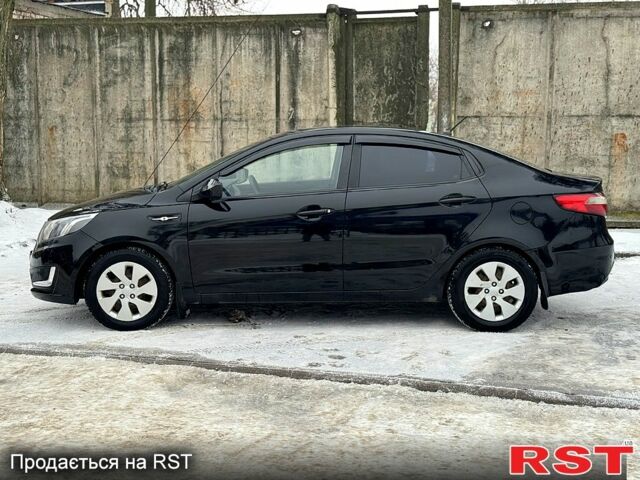 Черный Киа Рио, объемом двигателя 1.4 л и пробегом 155 тыс. км за 7500 $, фото 4 на Automoto.ua