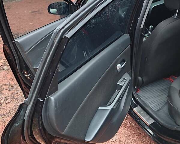 Черный Киа Рио, объемом двигателя 1.4 л и пробегом 170 тыс. км за 8500 $, фото 9 на Automoto.ua
