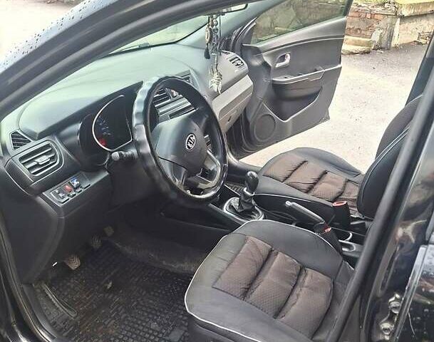 Черный Киа Рио, объемом двигателя 1.4 л и пробегом 197 тыс. км за 7000 $, фото 3 на Automoto.ua