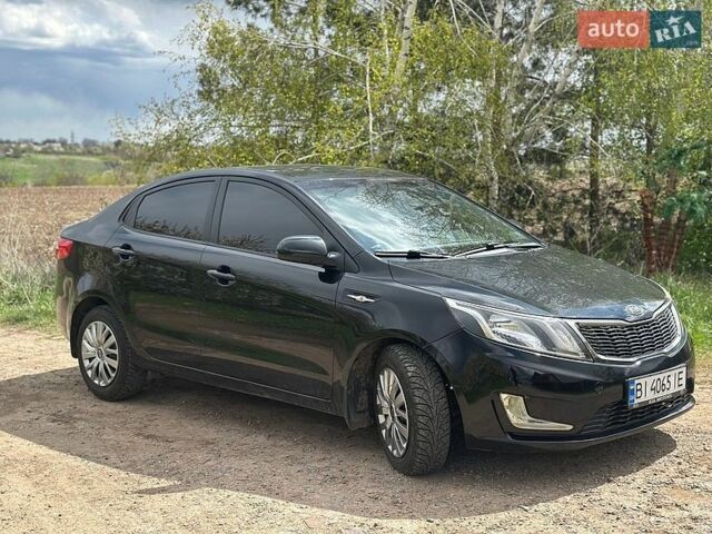 Черный Киа Рио, объемом двигателя 1.4 л и пробегом 108 тыс. км за 7950 $, фото 2 на Automoto.ua