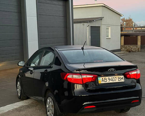 Чорний Кіа Ріо, об'ємом двигуна 1.4 л та пробігом 136 тис. км за 6900 $, фото 6 на Automoto.ua