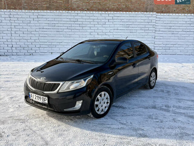 Черный Киа Рио, объемом двигателя 1.6 л и пробегом 270 тыс. км за 6650 $, фото 1 на Automoto.ua