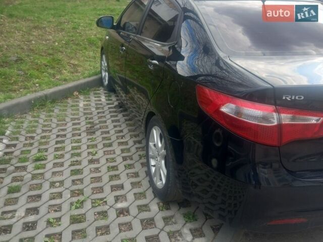Черный Киа Рио, объемом двигателя 1.4 л и пробегом 213 тыс. км за 8700 $, фото 4 на Automoto.ua